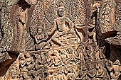 Banteay Srei temple - southern library west pediment, Kama aiming an arrow to Shiva 